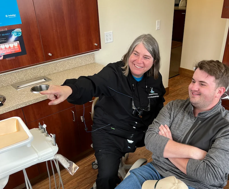 Dr. Trembath with a patient planning their smile